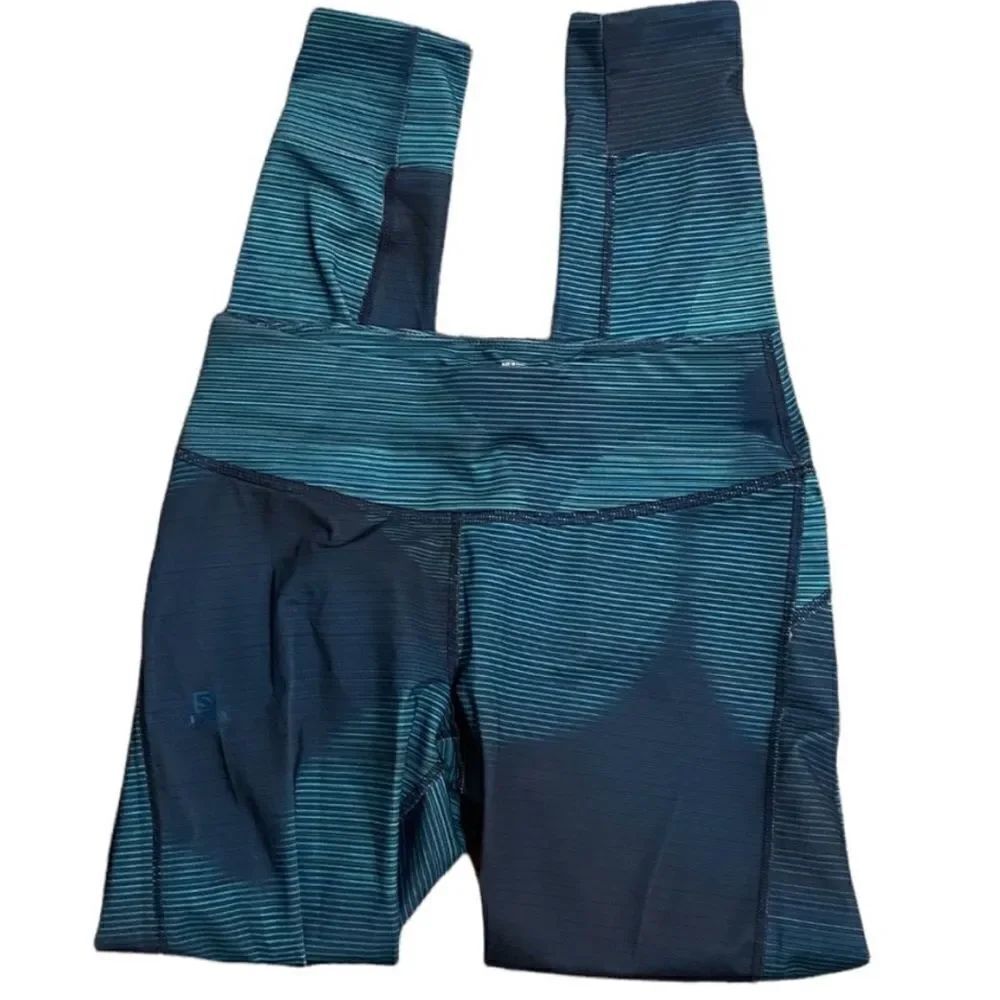 Salomon Teal Green Agile Long Leggings
Size Small